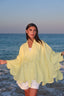 Butter yellow poncho