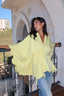 Butter yellow poncho